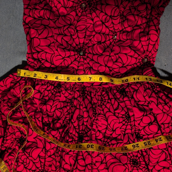 Pinup Couture Aurora Dress in Red with Flocked Black Spider Web - Picture 7 of 7